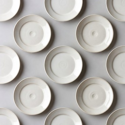 White Plates Pattern on Gray Background