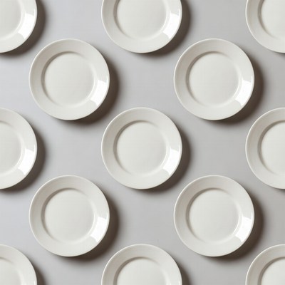White Plates Arranged on Gray Background