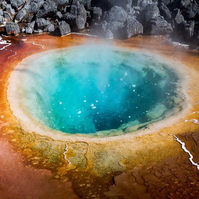Vibrant turquoise hot spring pool