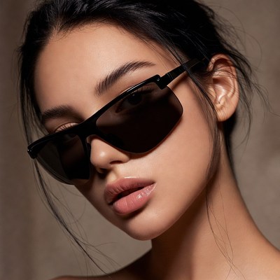 Asian woman wearing black sunglasses