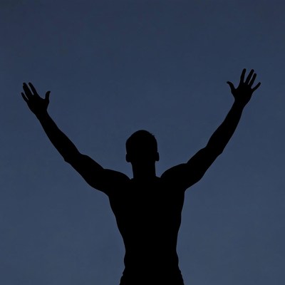 Man raising arms silhouette