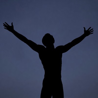 Man with arms raised silhouette