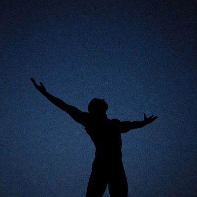 Man raising arms silhouette