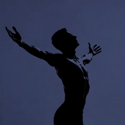 Silhouette of man with arms raised