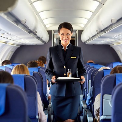 Flight Attendant Serving Drink Airplane