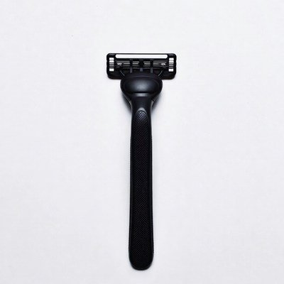 Black Razor on White Background