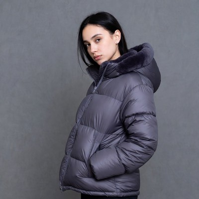 Woman in gray puffer jacket