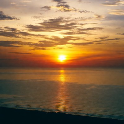 Sunset over calm ocean