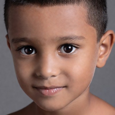 Close-up portrait of young Asian boy