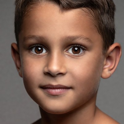 Young boy smiling close-up portrait