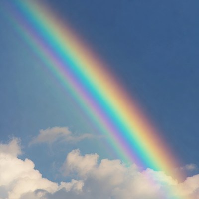Vibrant Rainbow Over Blue Sky