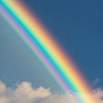 Vibrant Rainbow Over Blue Sky