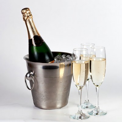 Champagne Bottle in Ice Bucket with Glasses