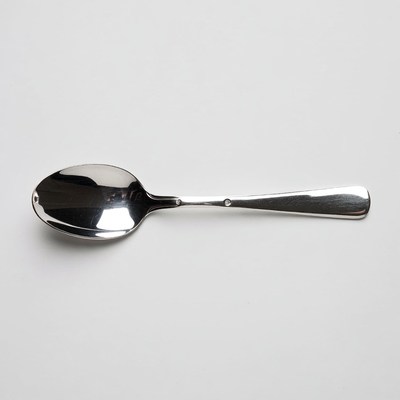 Shiny silver teaspoon isolated