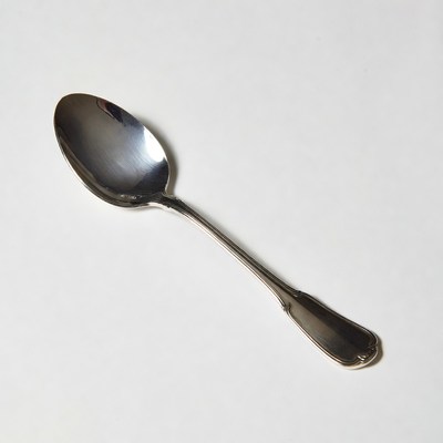 Shiny silver serving spoon