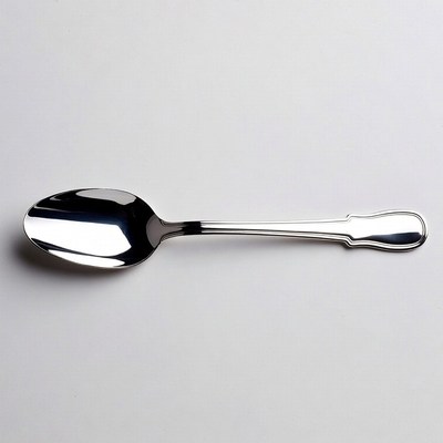 Shiny silver serving spoon