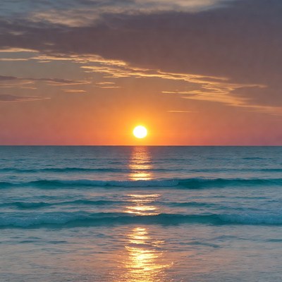 Sunset over ocean waves