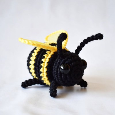 Crocheted black and yellow bumblebee