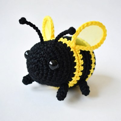 Crocheted yellow bumblebee toy