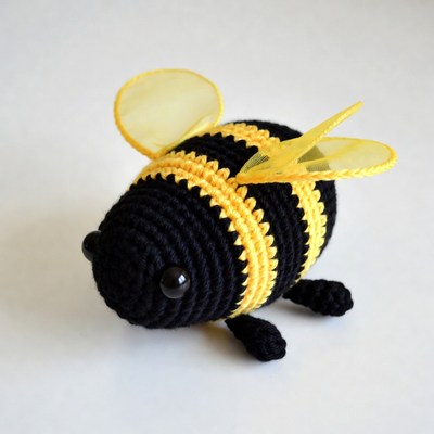 Crocheted yellow black bee toy
