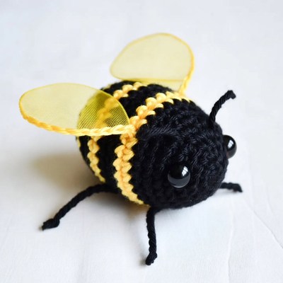 Crocheted black and yellow bumblebee