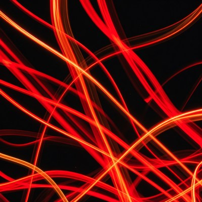 Red Light Trails on Black Background