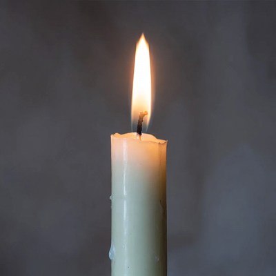 Burning White Candle Flame