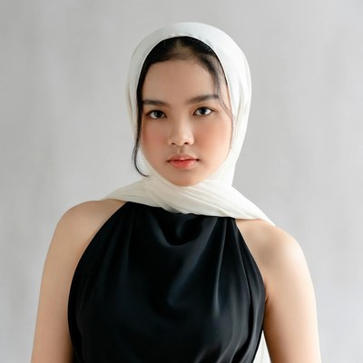 Asian woman in white hijab