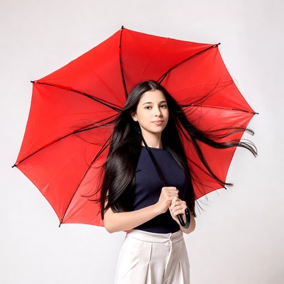 Asian woman holding red umbrella