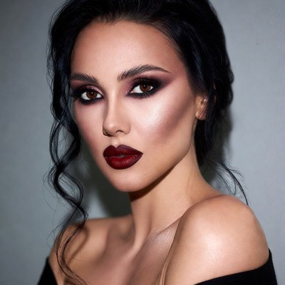 Woman with dark smokey eyes makeup