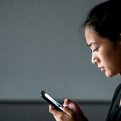 Asian woman using smartphone