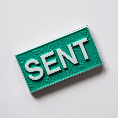 Green SENT Label on White Background