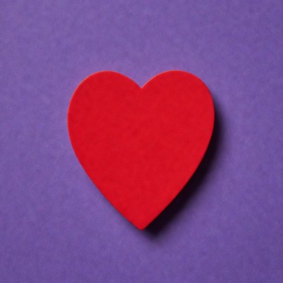 Red heart on purple background