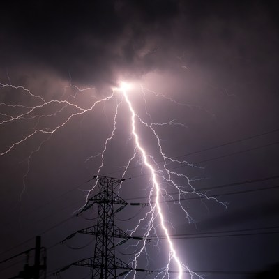 Lightning striking near power pole