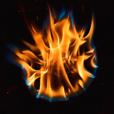Fiery orange flames on black background