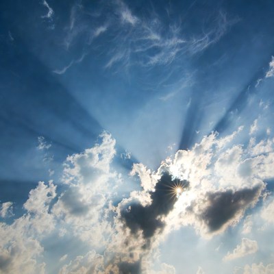 Sun rays through clouds