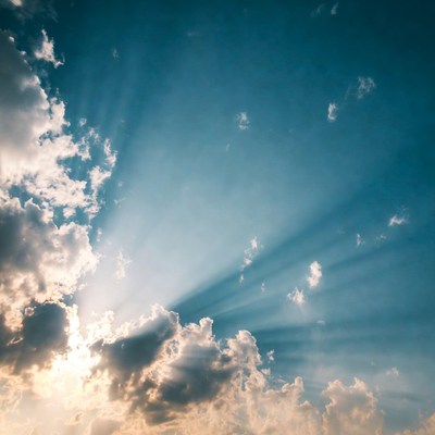 Sun rays through dramatic clouds