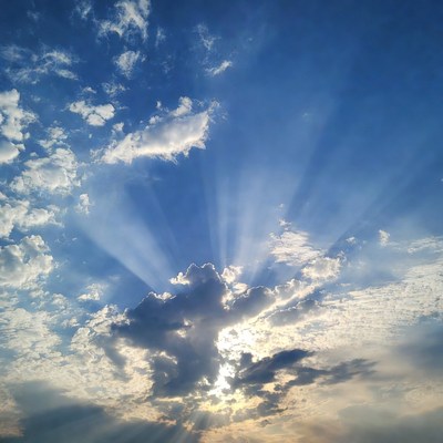 Sun rays through clouds