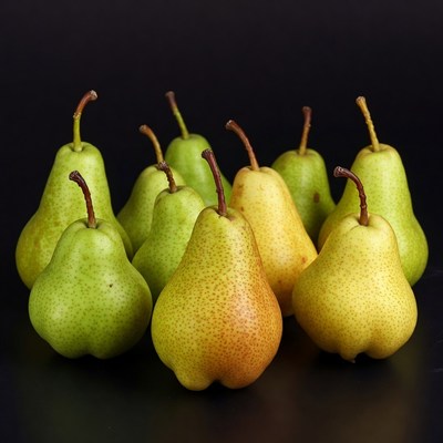 Fresh green pears on black background