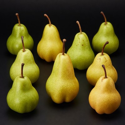 Fresh green pears on black background