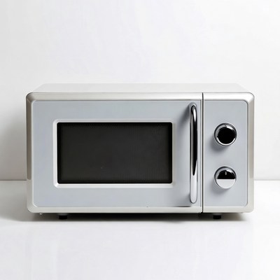 Silver microwave oven on white background