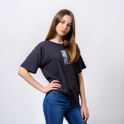 Teen girl posing in black t-shirt jeans