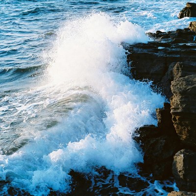 Ocean Wave Crashing on Rocks