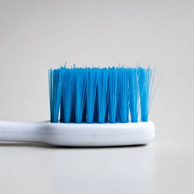 Blue toothbrush on white background