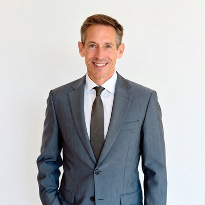 Smiling man in gray suit