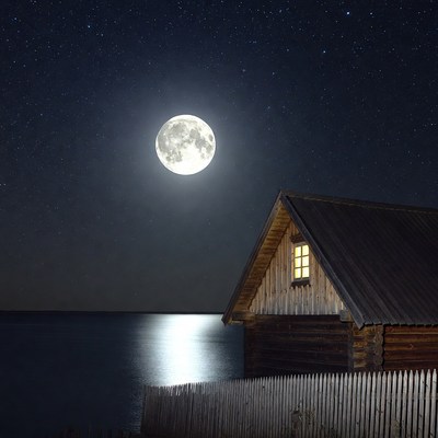 Full Moon Over Lakeside Cabin
