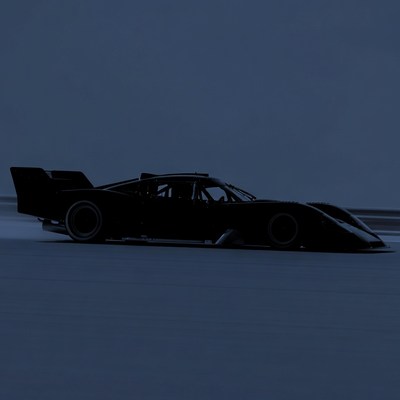 Black silhouette race car speeding