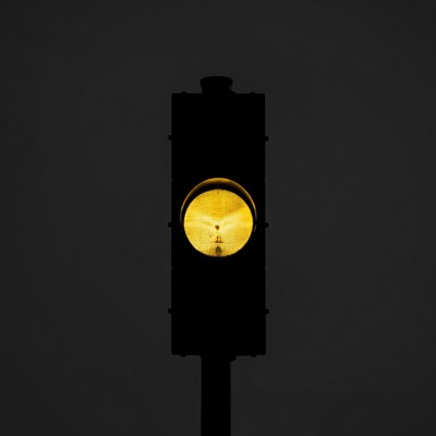 Yellow traffic light glowing