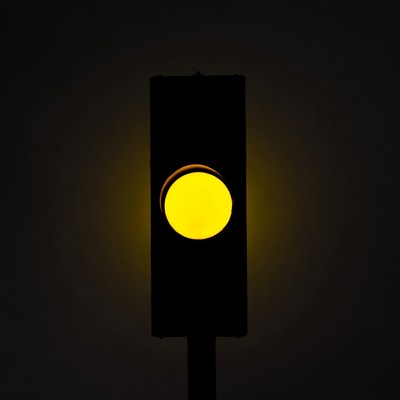 Yellow Traffic Light Illuminated