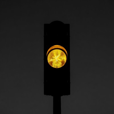 Yellow Traffic Light Illuminated